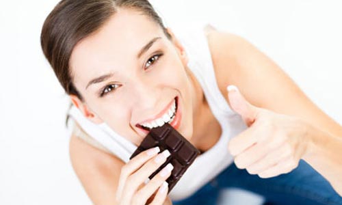 woman-eating-chocolate-happy