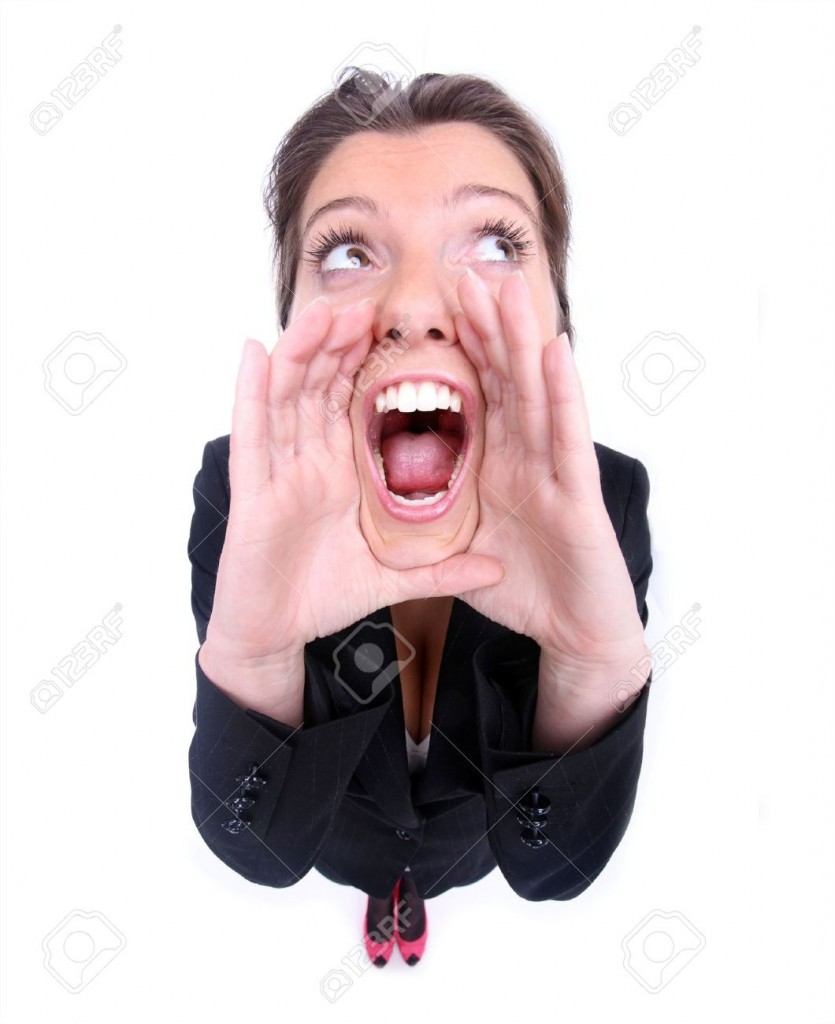 closeup-of-a-young-woman-shouting-out-over-white-background-Stock-Photo