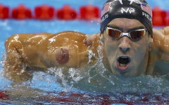 Michael Phelps of the US is seen with a red cupping mark on his shoulder as he competes in the Men's 4 x 100m Freestyle Relay Final at the 2016 Rio Olympics in Rio de Janeiro