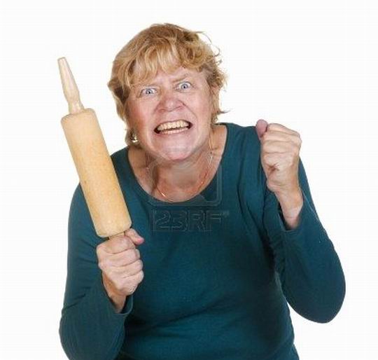 very-furious-woman-with-wooden-roller-pin1