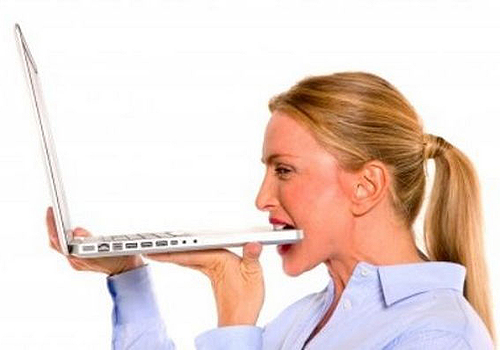 women-biting-laptops-stock-images-011